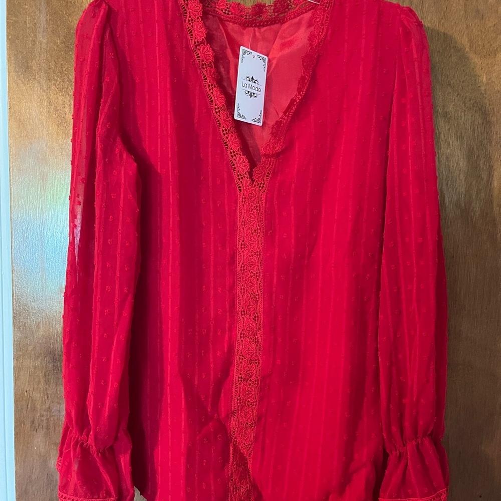 Brand new red woman’s blouse